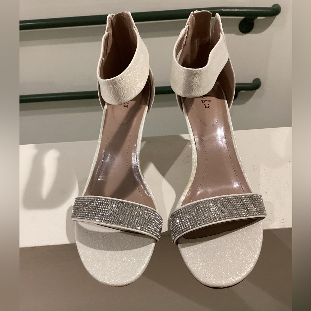 Style & Co.'s Phillyis  evening sandals sleek ankle strap and glitter details